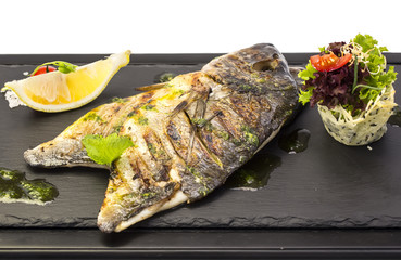 sea fish cooked on the grill