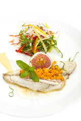 Baked fish with salad on a white background in restaurant