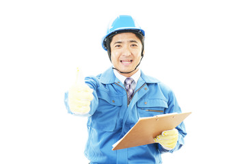 ガッツポーズの作業員