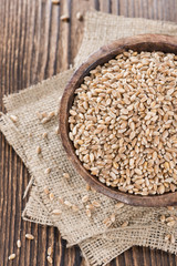 Wheat Grains on wooden table