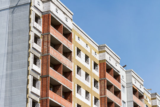 Apartment building facade with thermal insulation