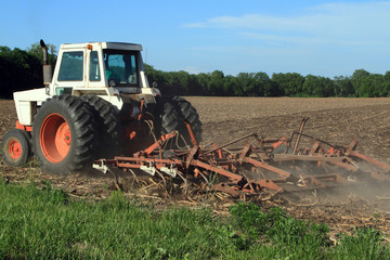 Tractor Plowing The Field