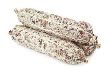 three sticks of salami