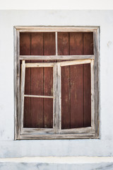 Obraz na płótnie Canvas Old timber window frame boarded up