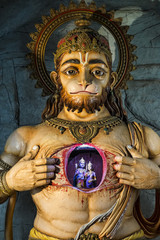 Illuminated statue of Hanuman showing Rama and Sita