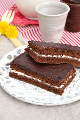 Chocolate layered cake with cream filling