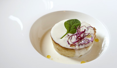 Leek flan served on Parmigiano Reggiano cheese fondue