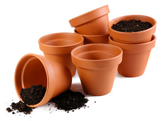 Clay flower pots and soil, isolated on white