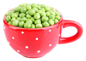Fresh green peas in mug isolated on white background