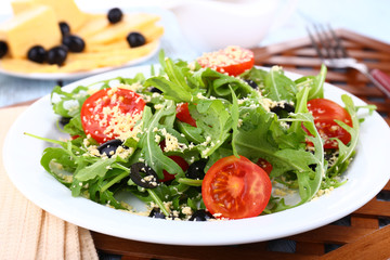 Fresh salad with arugula, close up