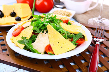Fresh salad with arugula, close up