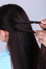 Creating hairstyles hairdresser close-up