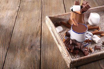 Cup of hot chocolate on table, close up
