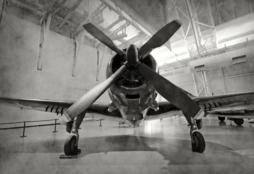 Old Airplane In A Hangar