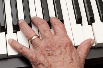 Old Hand on Piano Keys