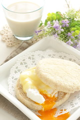 poached egg and cheese in English muffin Sandwish