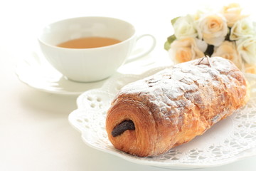 home bakery, chocolate pastry with English tea on background