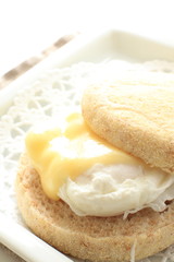 poached egg and chesse in English muffin for gourmet sandwich 