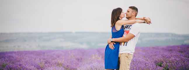Young couple in the lavender field