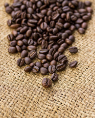 Coffee beans on linen background