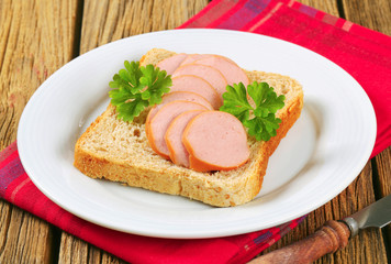 Whole wheat bread with sliced sausage