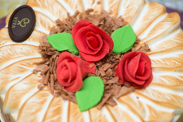 Topping of cake with cream