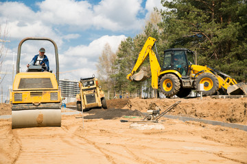 Road Works with Construction Equipment