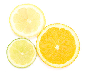 Slices of lime, lemon and orange isolated on white