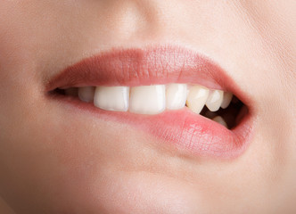 Biting her red lips teeth - 66854167