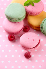 Gentle macaroons on table close-up