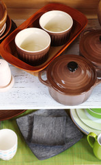 Different tableware on shelf, close up