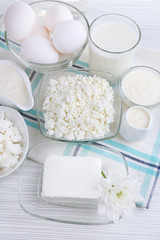 Tasty dairy products on wooden table