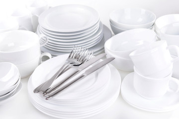 Set of white dishes close-up