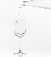 Pouring water on glass