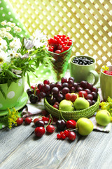 Still life with berries and flowers