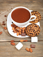 Cup of hot chocolate on table, close up