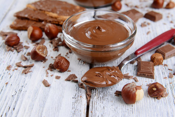 Sweet chocolate cream in bowl on table close-up