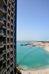 The view from the window hotel of the buildings and bay in Abu D