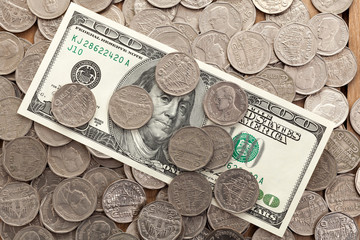 Money with dollar bills and baht coins