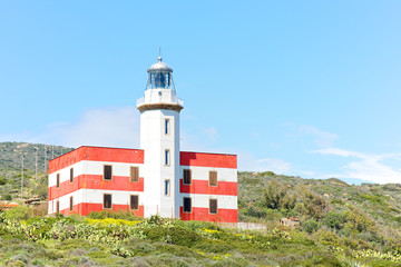 Fototapeta na wymiar Capel Rosso's lighthouse, Giglio island, Italy
