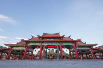Red gateway of chinese temple, with blue sky