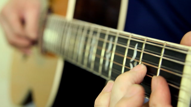 Musical instrument with guitarist hands