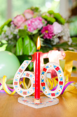 60. geburtstag mit kerze