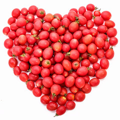 Heart-shaped tomatoes isolated on a white background