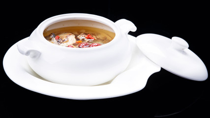 Meat stew,Chinese traditional cuisine isolated on black backgrou