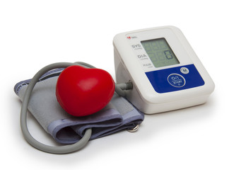 Digital blood pressure meter on white background