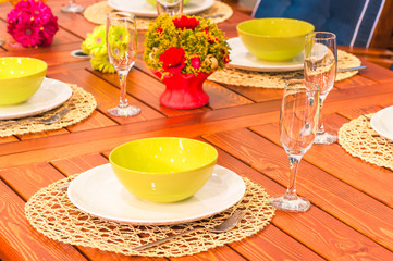 beautifully set table in bright colors