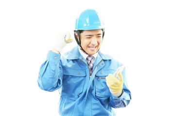 ガッツポーズの労働者