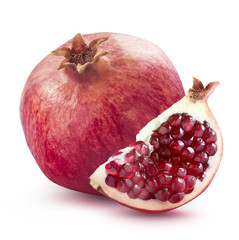 Whole pomegranate and quarter slice isolated on white background