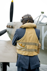 RAF Pilot With Spitfire Pilot - obrazy, fototapety, plakaty